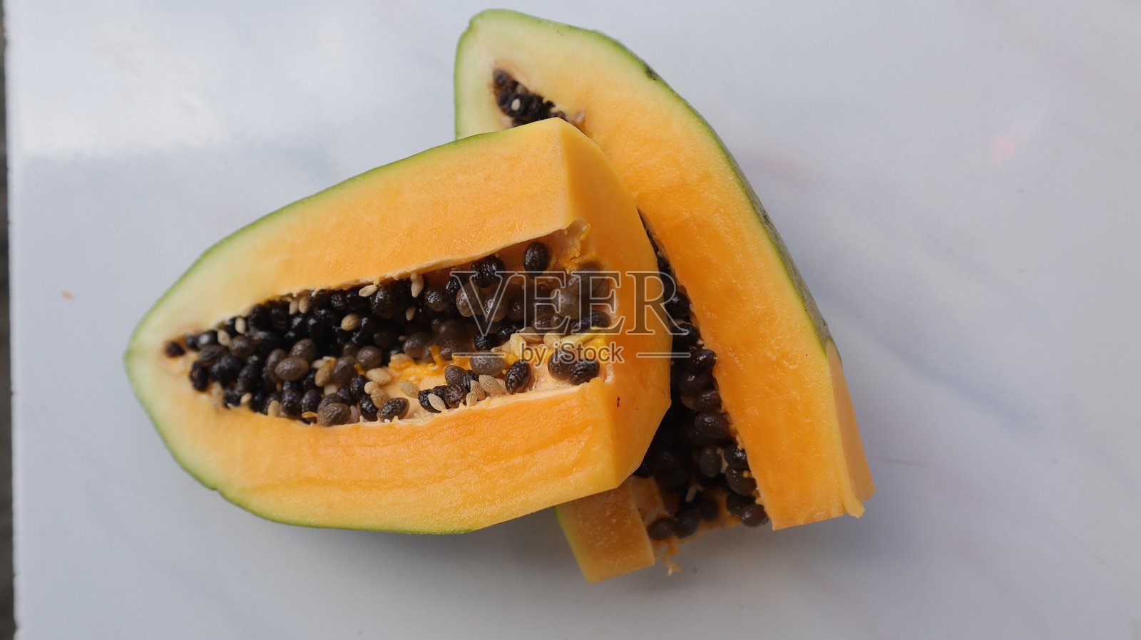 新鲜成熟的木瓜果实照片摄影图片