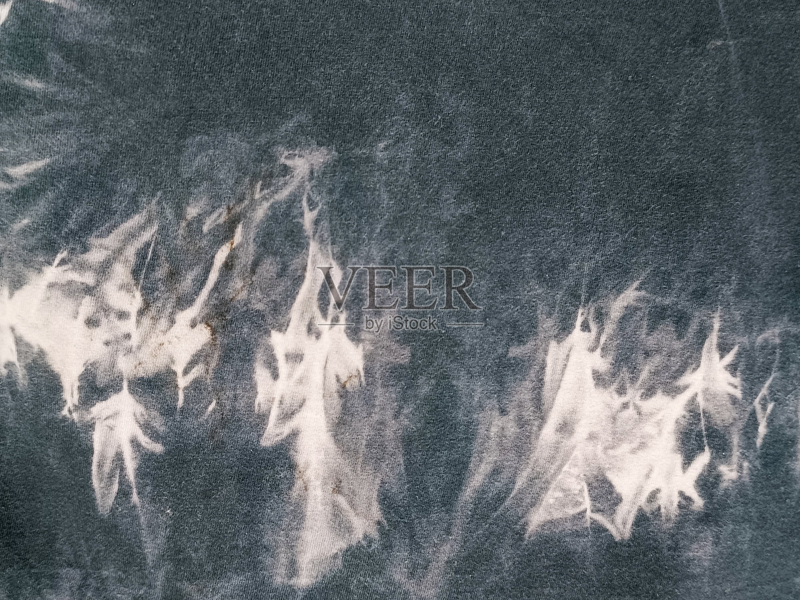 黑白扎染图案抽象背景。照片摄影图片