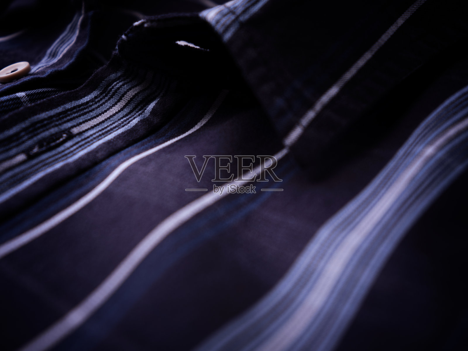 男士格子衬衫的特写。照片摄影图片