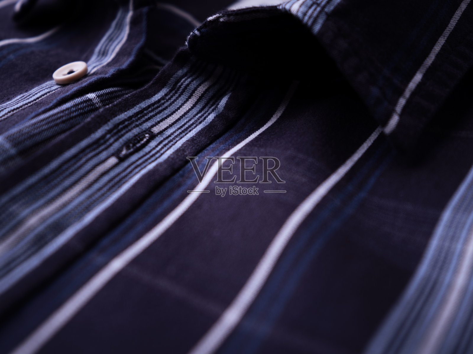 男士格子衬衫的特写。照片摄影图片