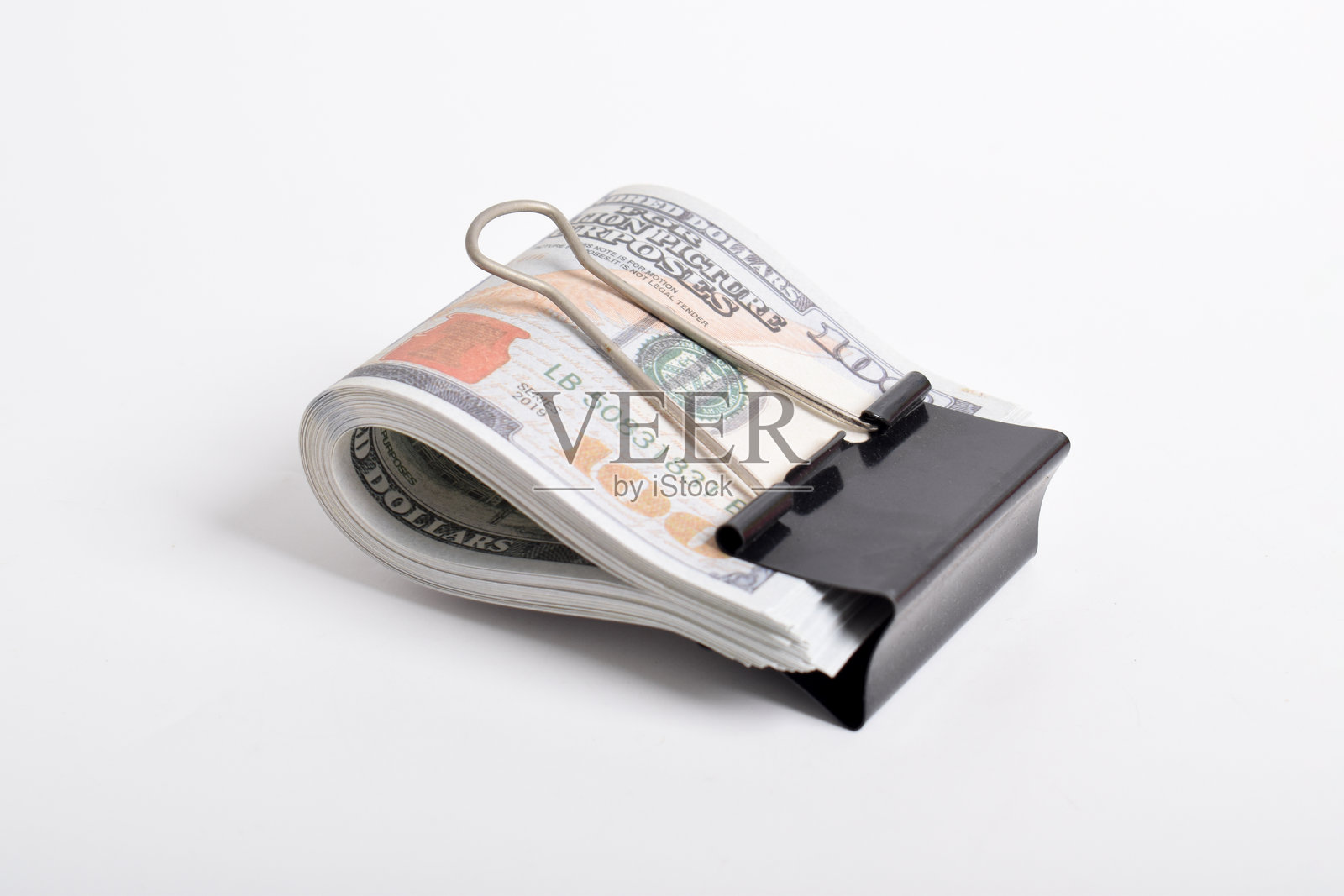 带金属夹子的美元。钞票，美元照片摄影图片