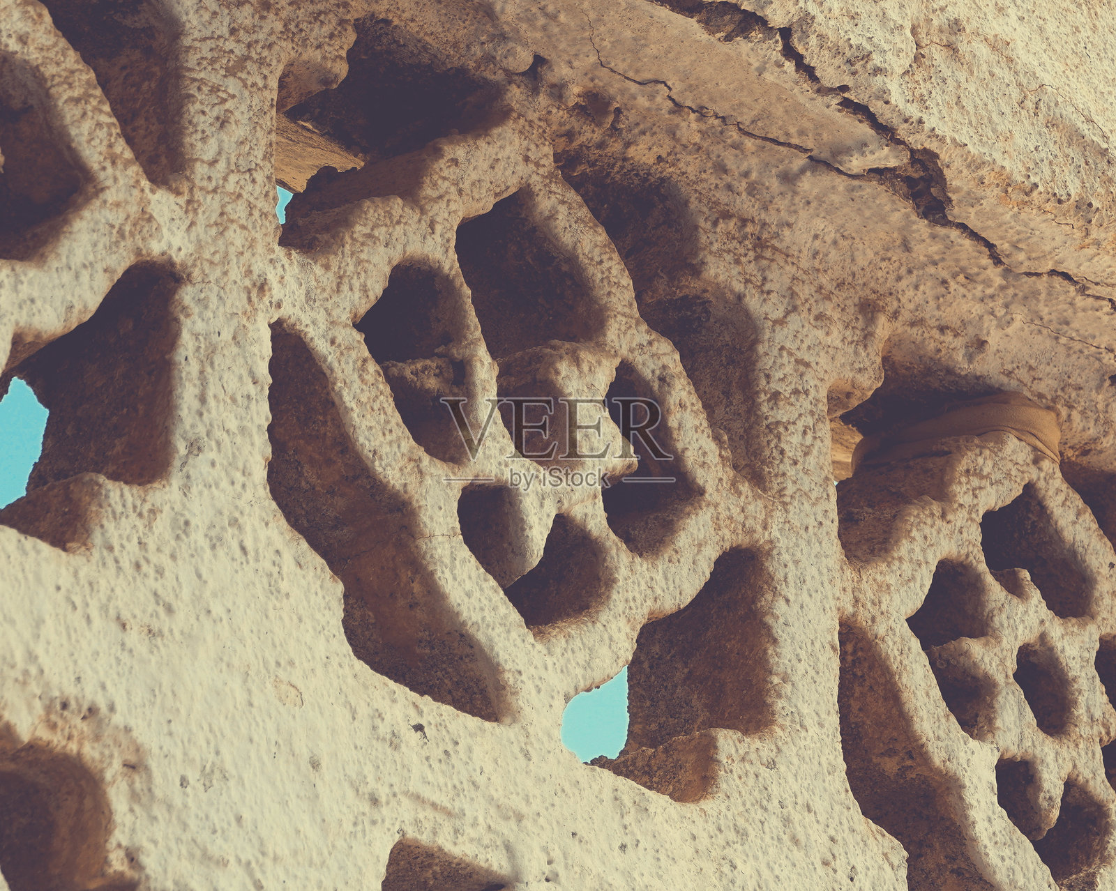 古老石墙雕刻细节特写暖色调照片摄影图片