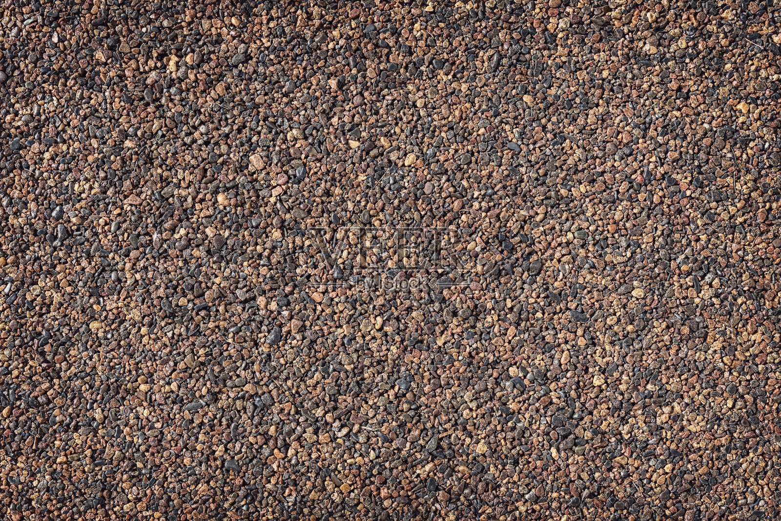 小黑棕色石头，背景，渐晕效果。照片摄影图片