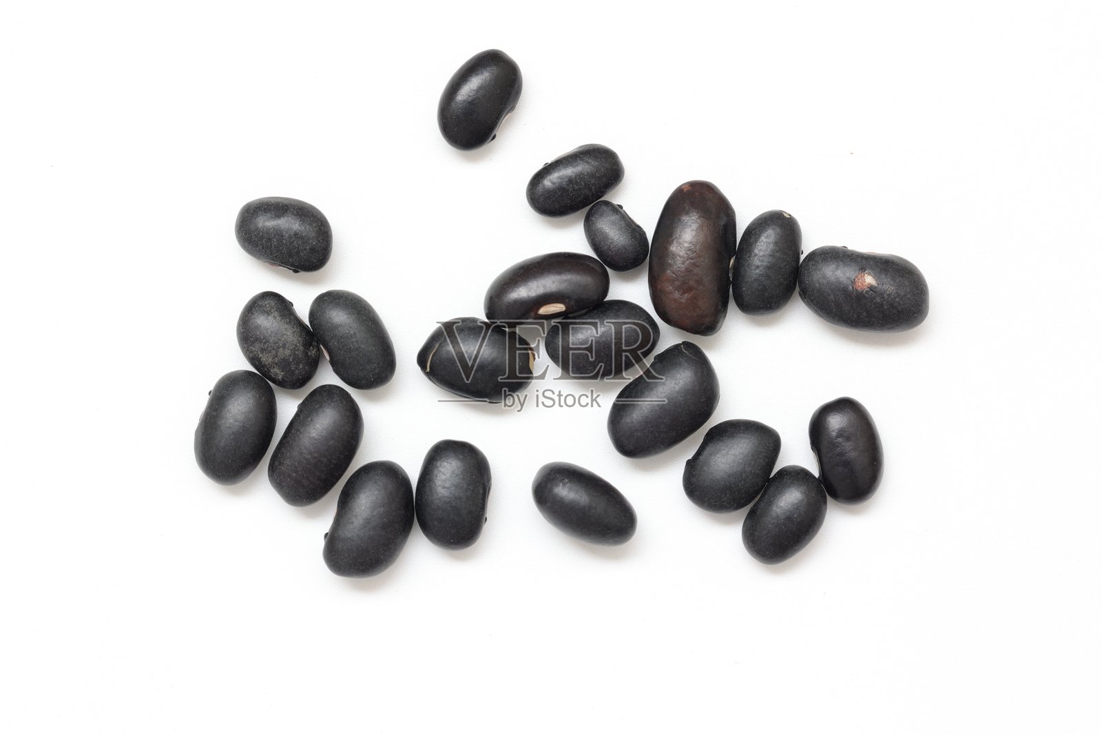 白色背景上的黑豆照片摄影图片