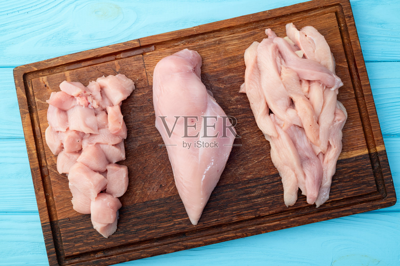 生鸡肉胸肉切片和切丁的各种形式照片摄影图片