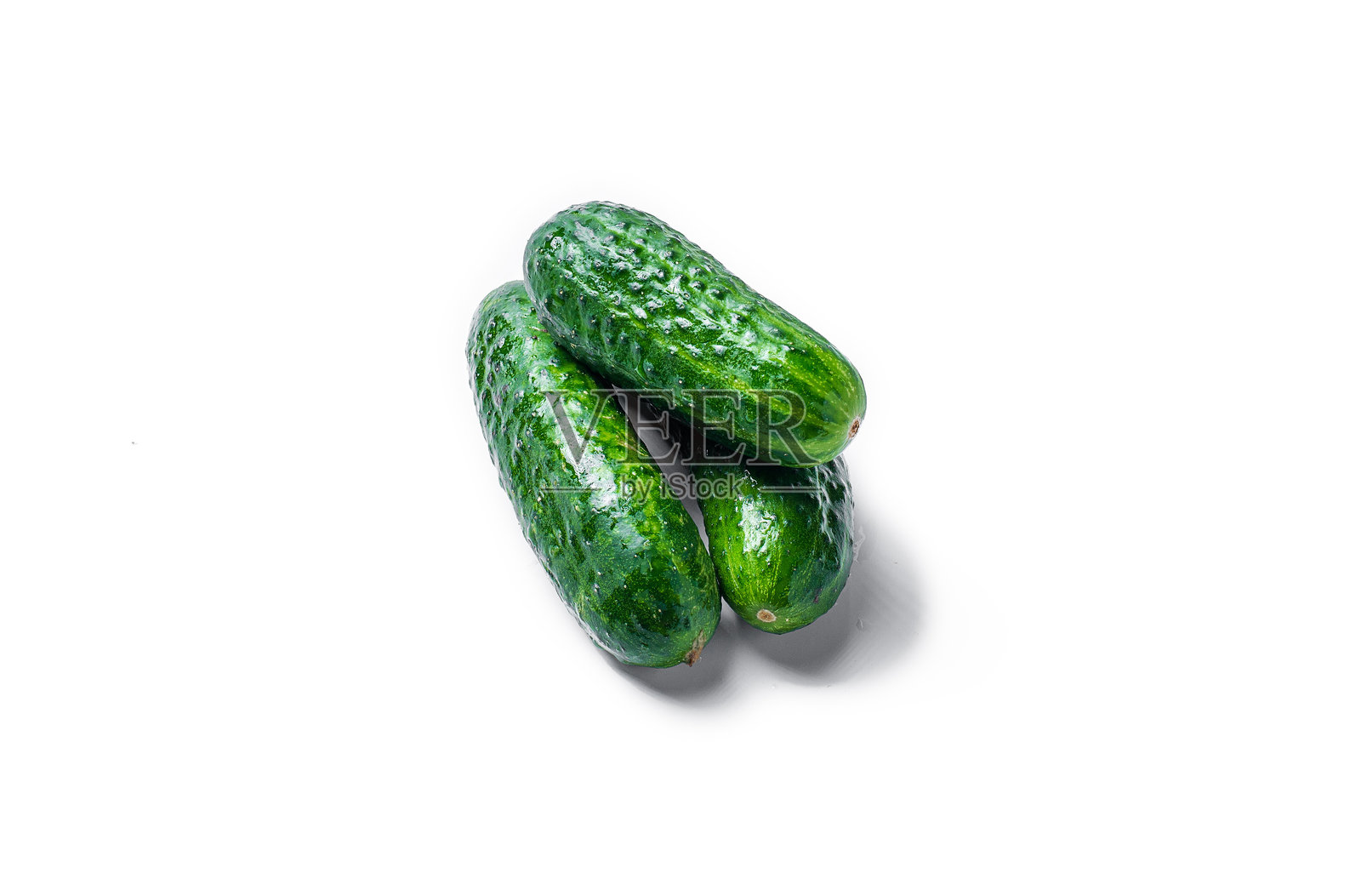 一堆黄瓜堆叠在一起照片摄影图片