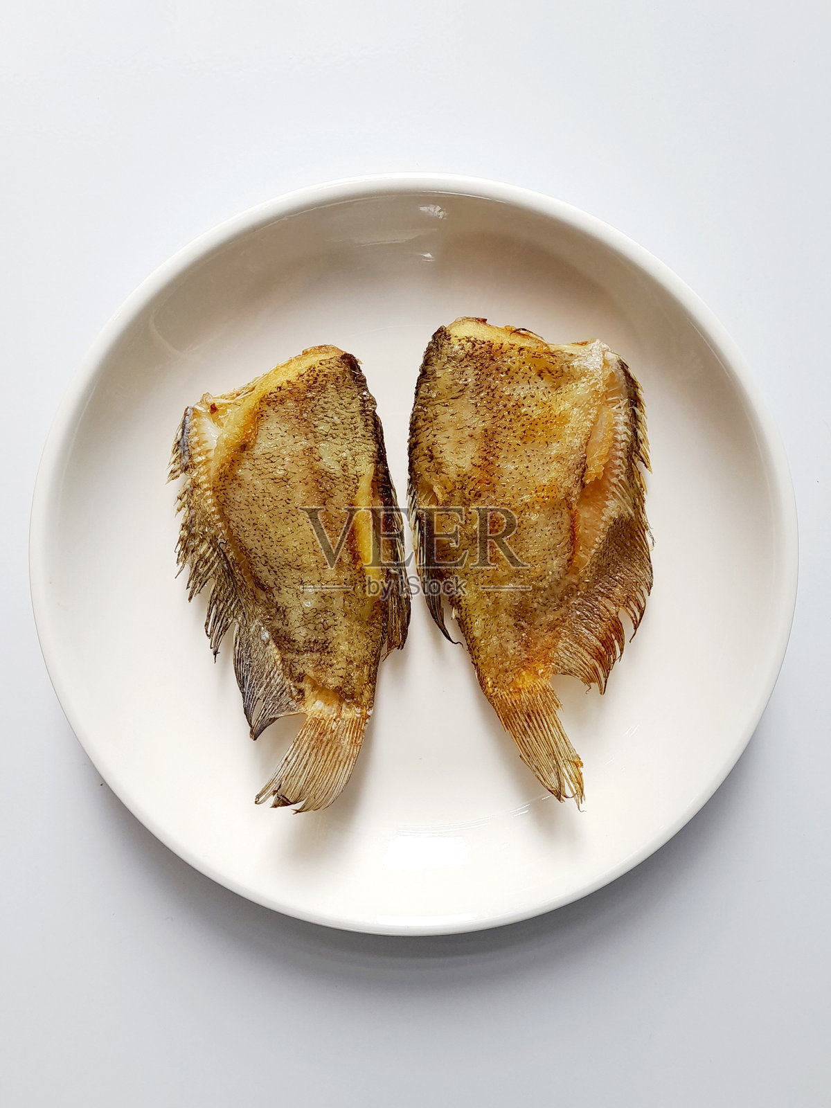 炸鱼。照片摄影图片