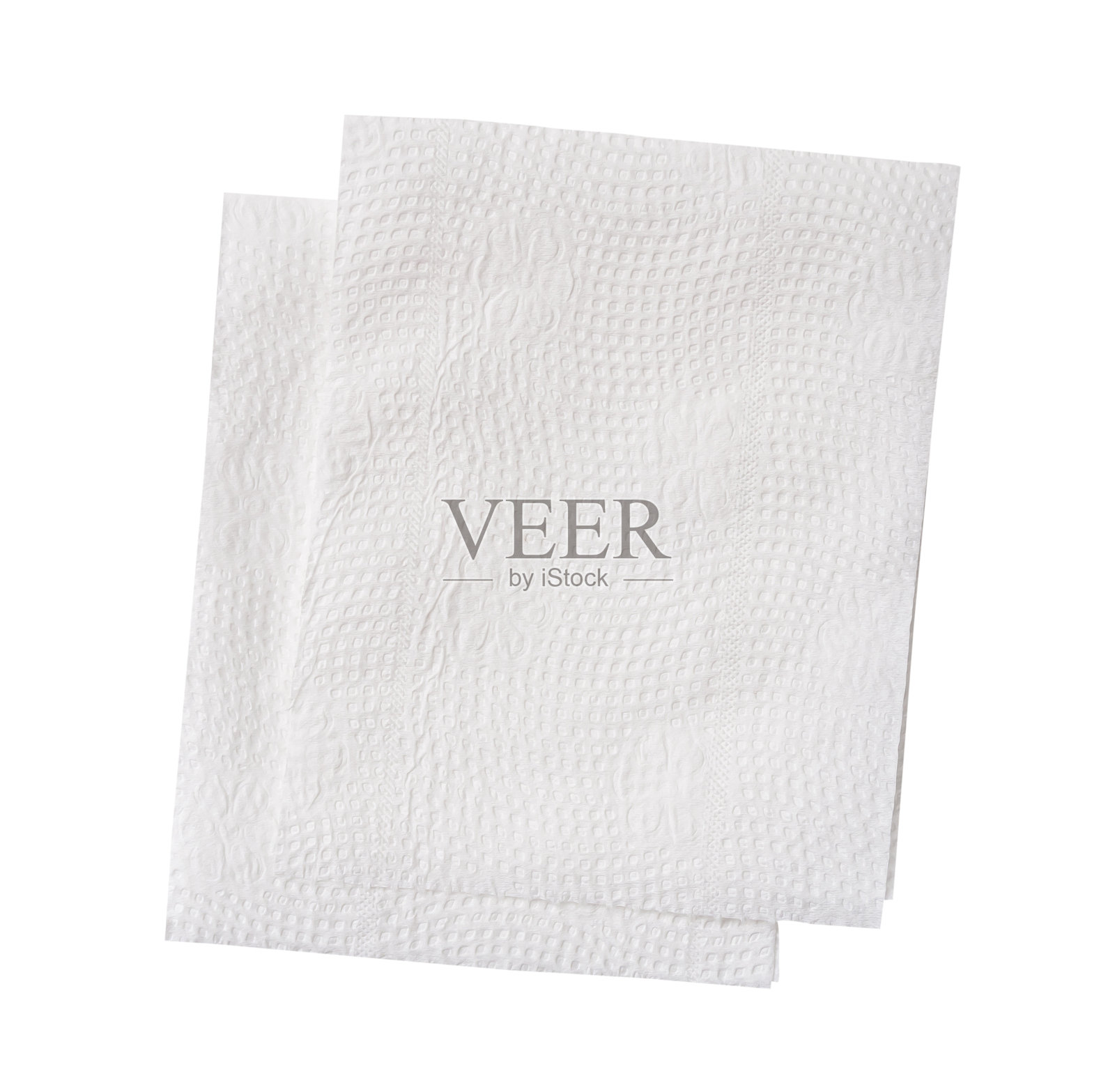 从上方看两片叠放的白色折叠纸巾或餐巾纸，背景为白色，带有抠图路径。照片摄影图片