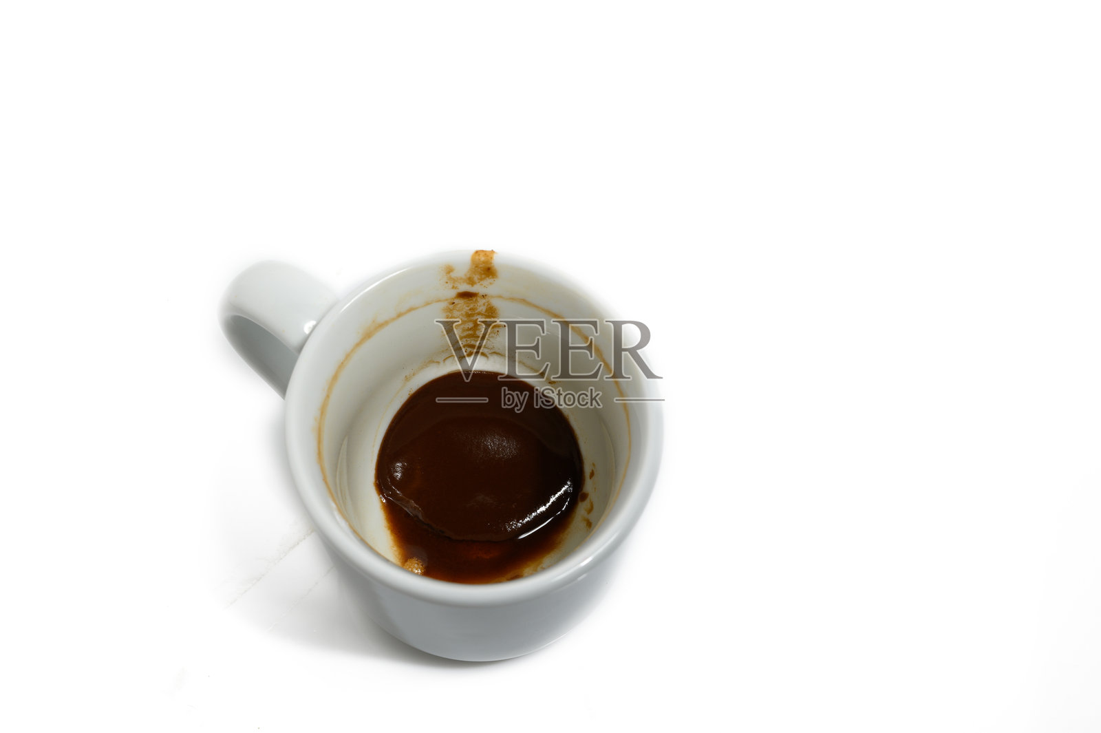 空咖啡杯，杯底留有残渣用于算命照片摄影图片
