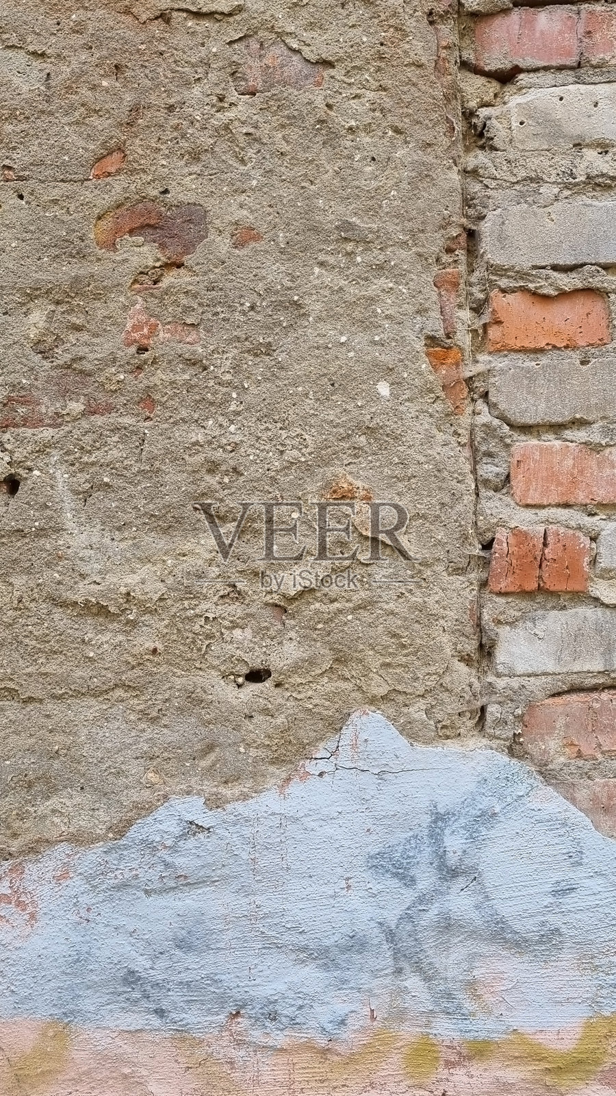 剥落的旧墙漆。用于设计的粗糙背景。选择性焦点。照片摄影图片