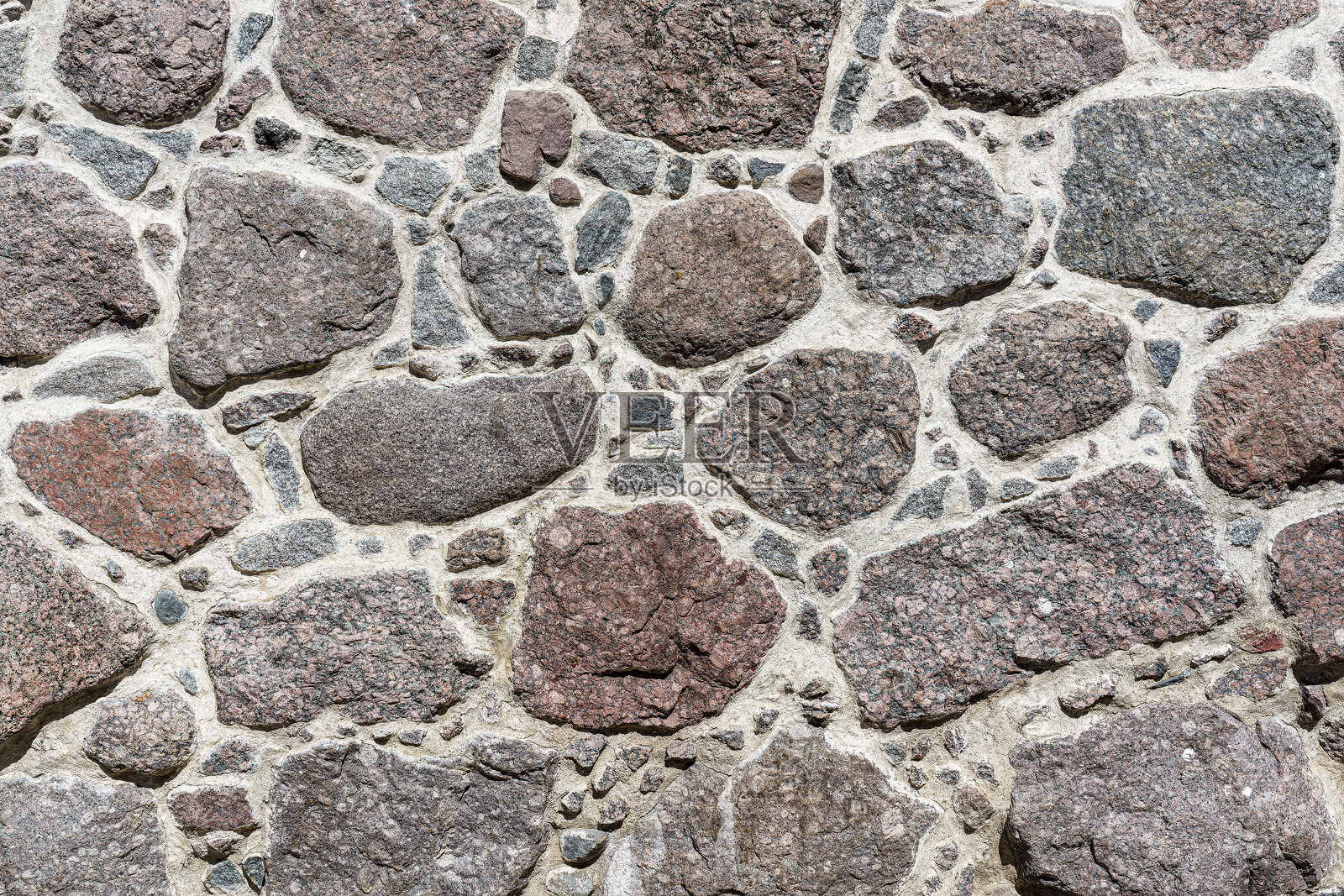 古老古董石墙的纹理。设计背景。照片摄影图片