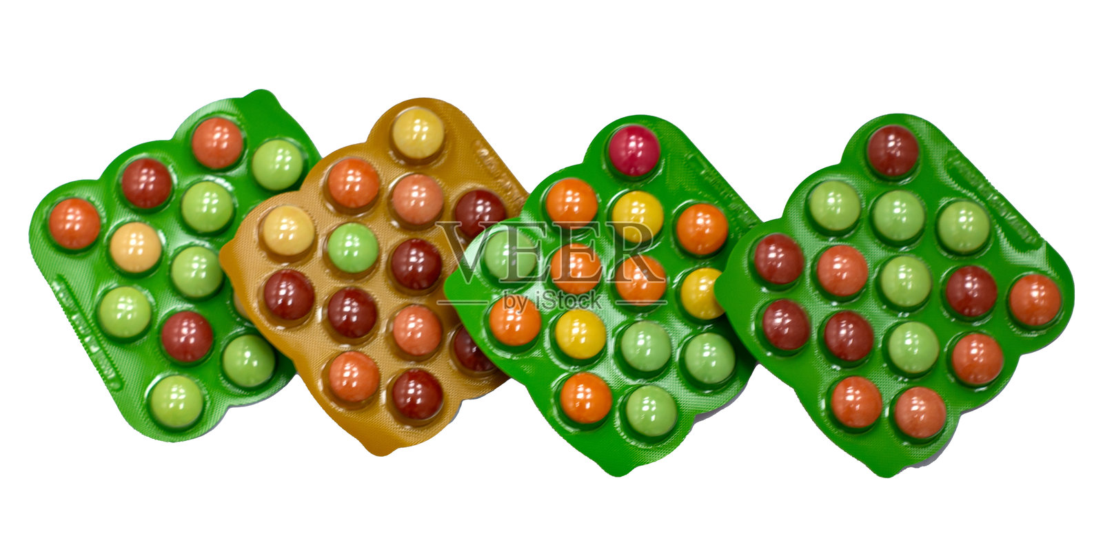 多色药片包装在白色背景上孤立。照片摄影图片