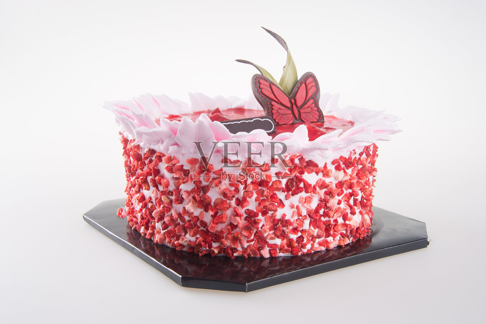 白色背景上的蛋糕特写照片摄影图片