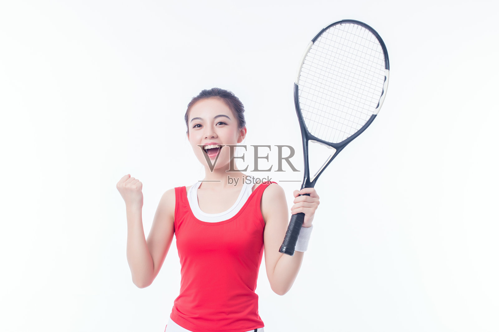 女孩独自在打网球照片摄影图片