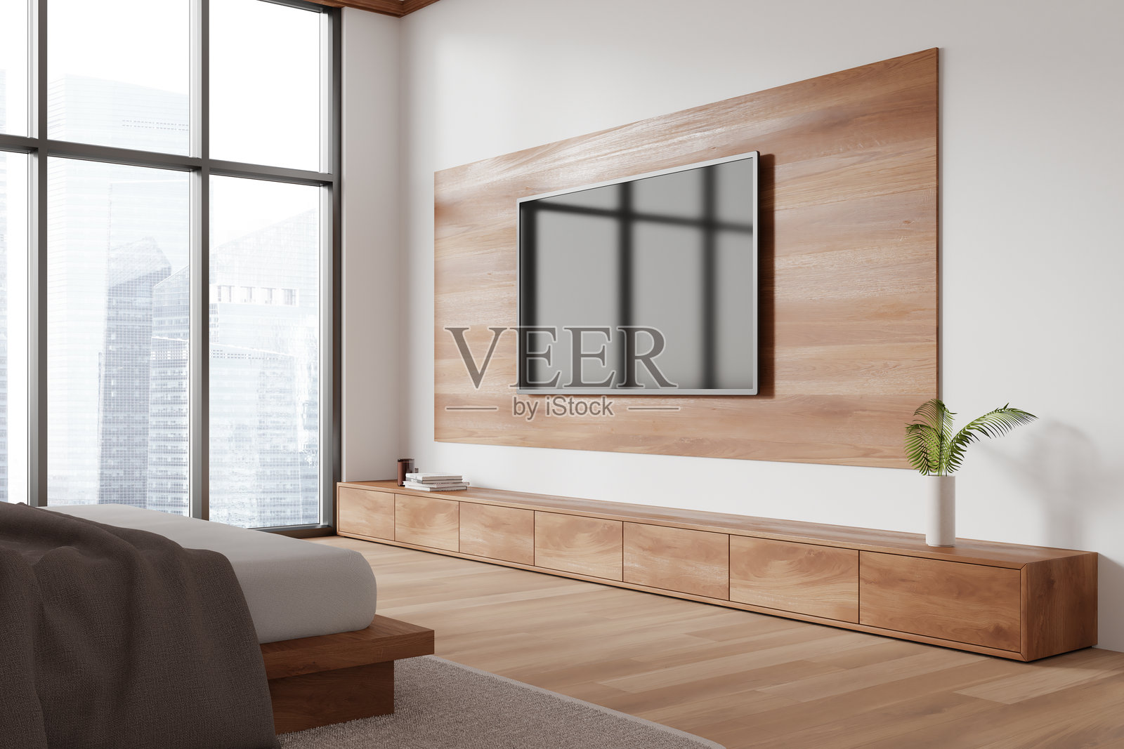 家居客厅室内，配有床和电视、边柜以及全景窗户照片摄影图片