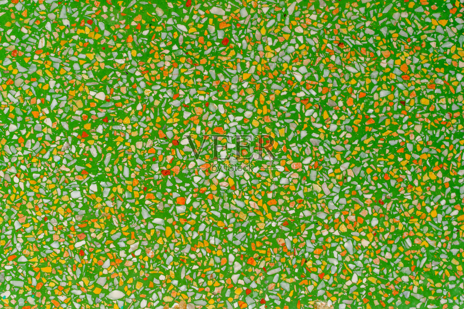 绿色背景， terrazzo 地板无缝图案。天然石材的绿色纹理。照片摄影图片