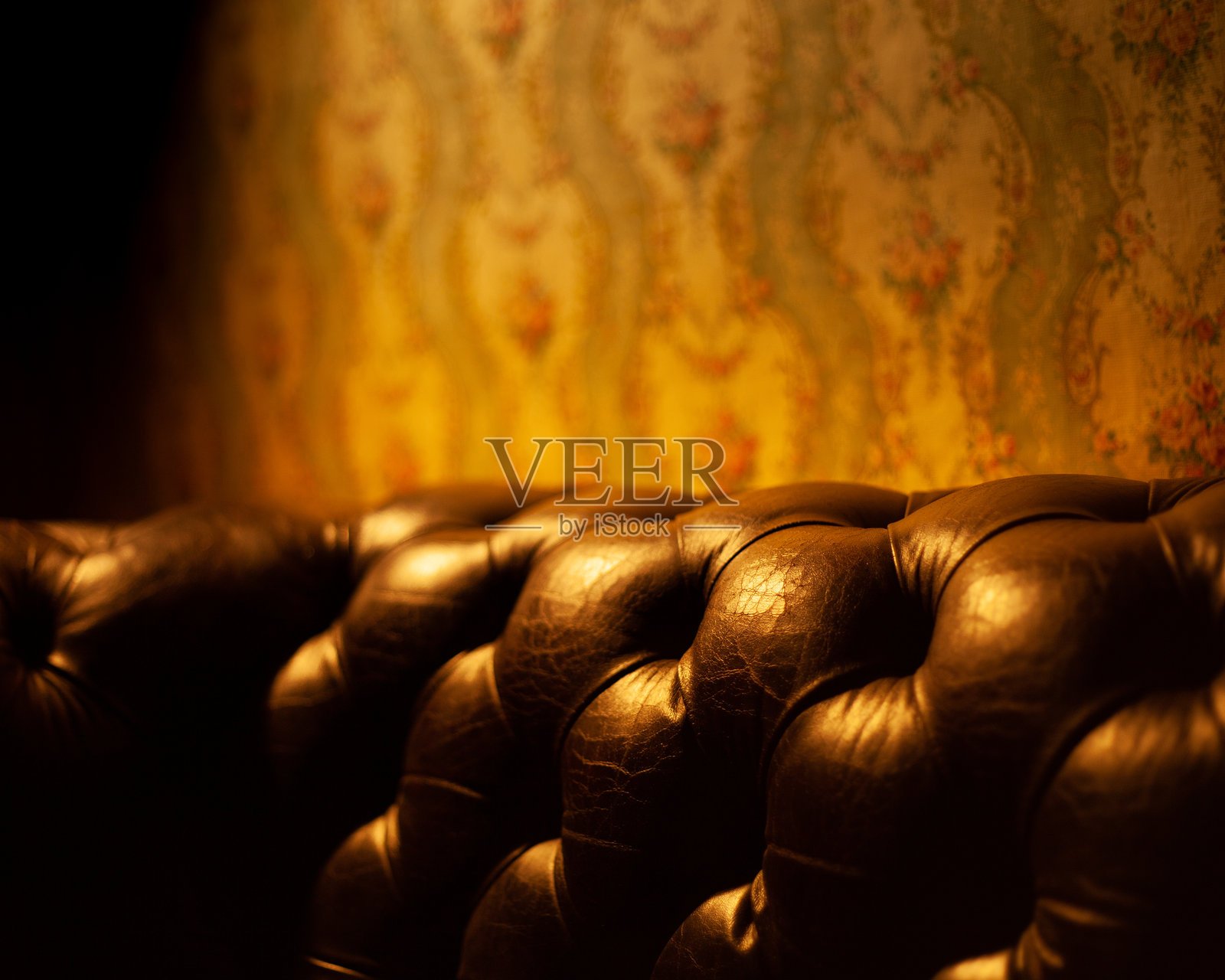 皮革切斯特菲尔德沙发照片摄影图片