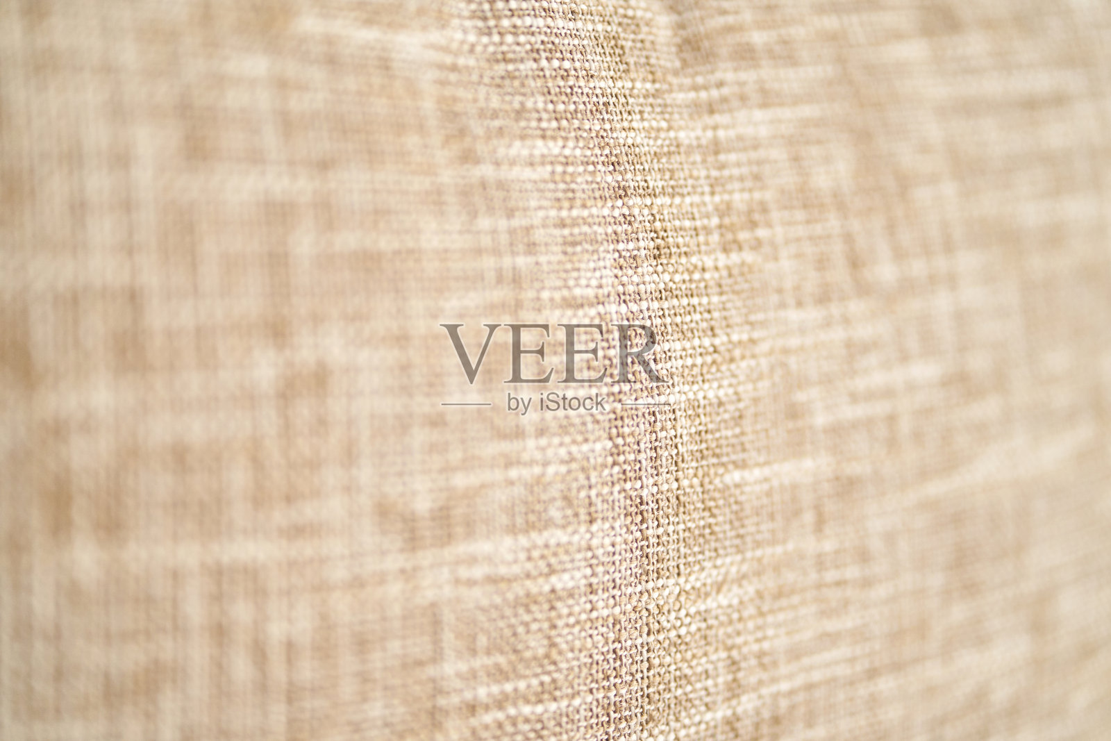 米色亚麻布料的特写纹理，带有编织图案和天然纤维照片摄影图片