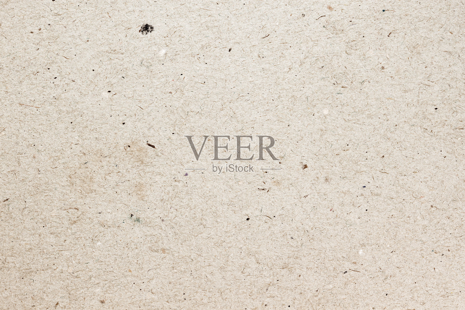 浅棕色纹理纸表面有小斑点和纤维，底色自然照片摄影图片