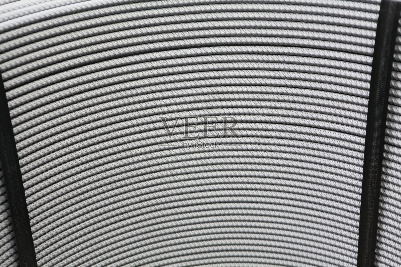 存储区的冷轧钢卷。钢铁工业厂房。照片摄影图片