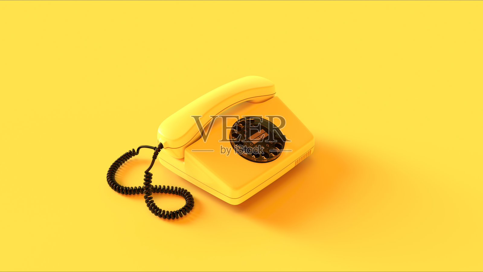 复古黄色旋转拨号电话，怀旧通讯，带有电话线的听筒，背景为四分之一侧视图。照片摄影图片
