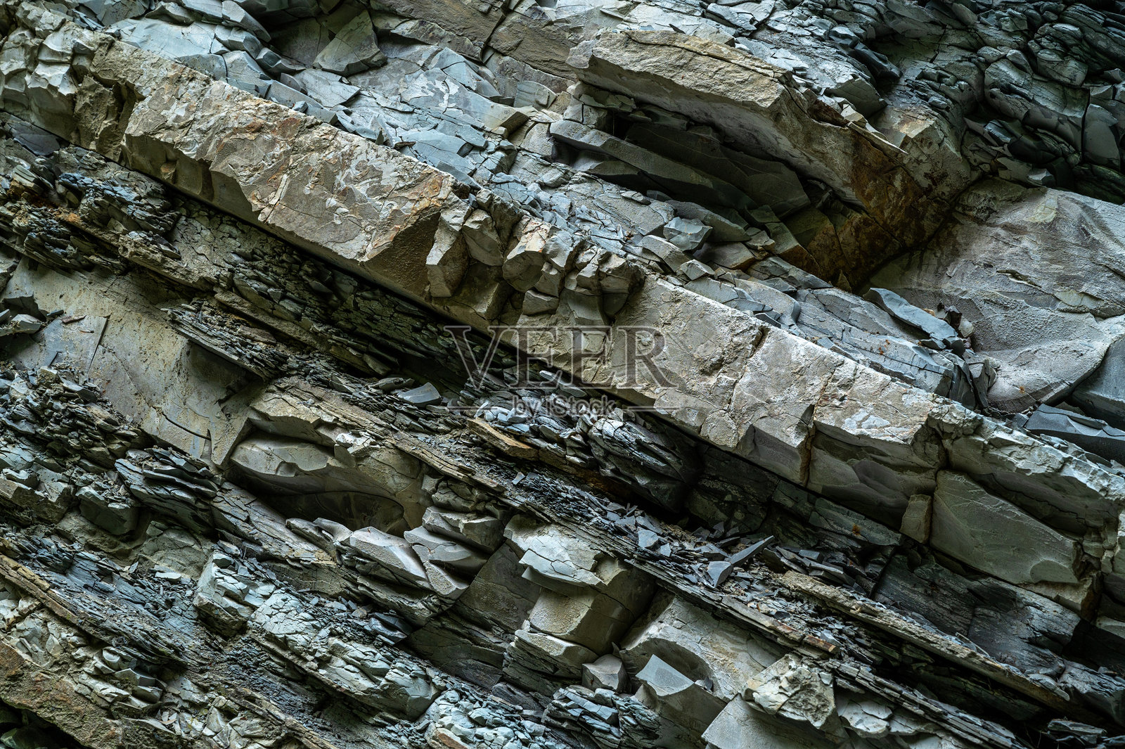 天然石墙。照片摄影图片