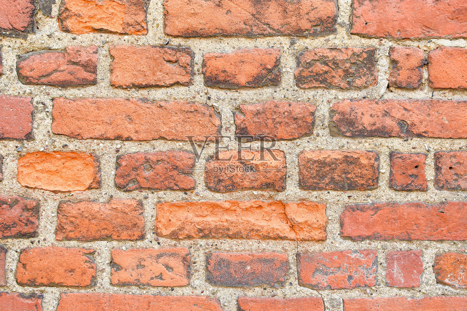 粗糙的红砖墙背景。照片摄影图片