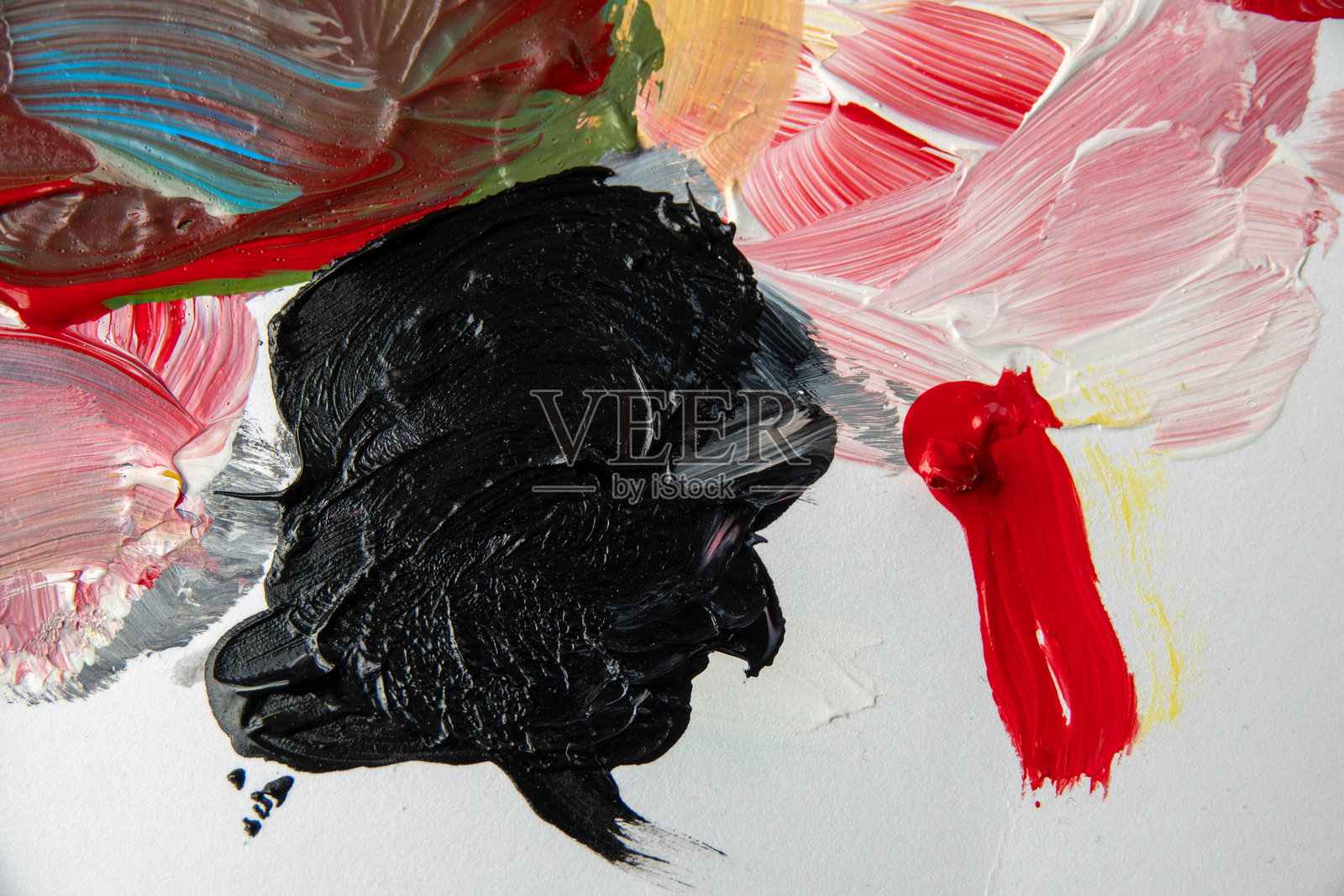 艺术家画笔上的混合色彩调色板照片摄影图片