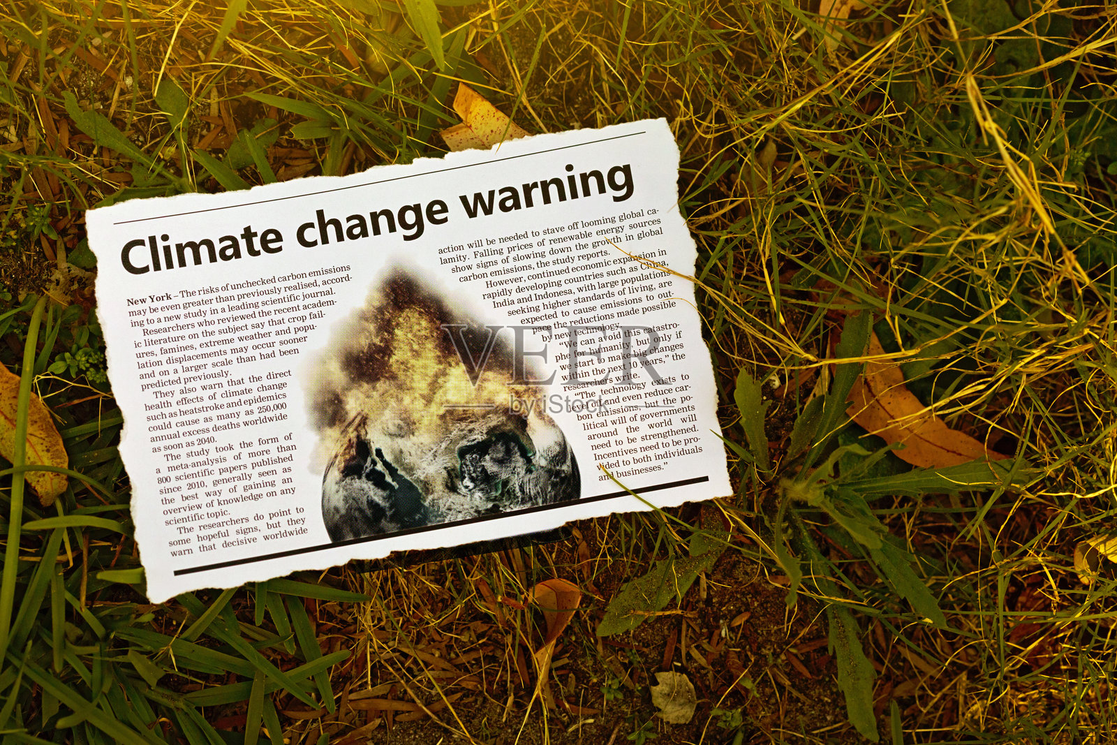 报纸上关于气候变化的警告照片摄影图片