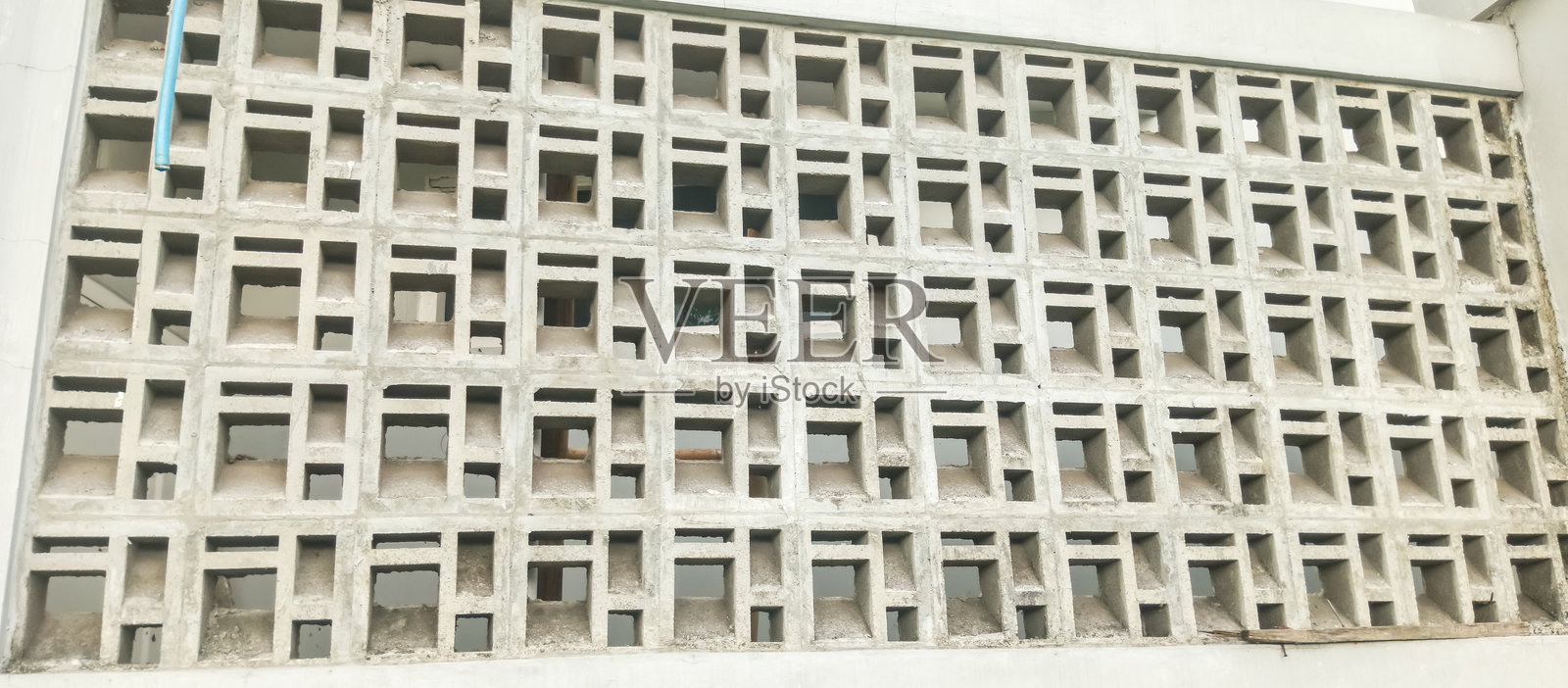 穿孔水泥墙背景 穿孔水泥墙照片摄影图片