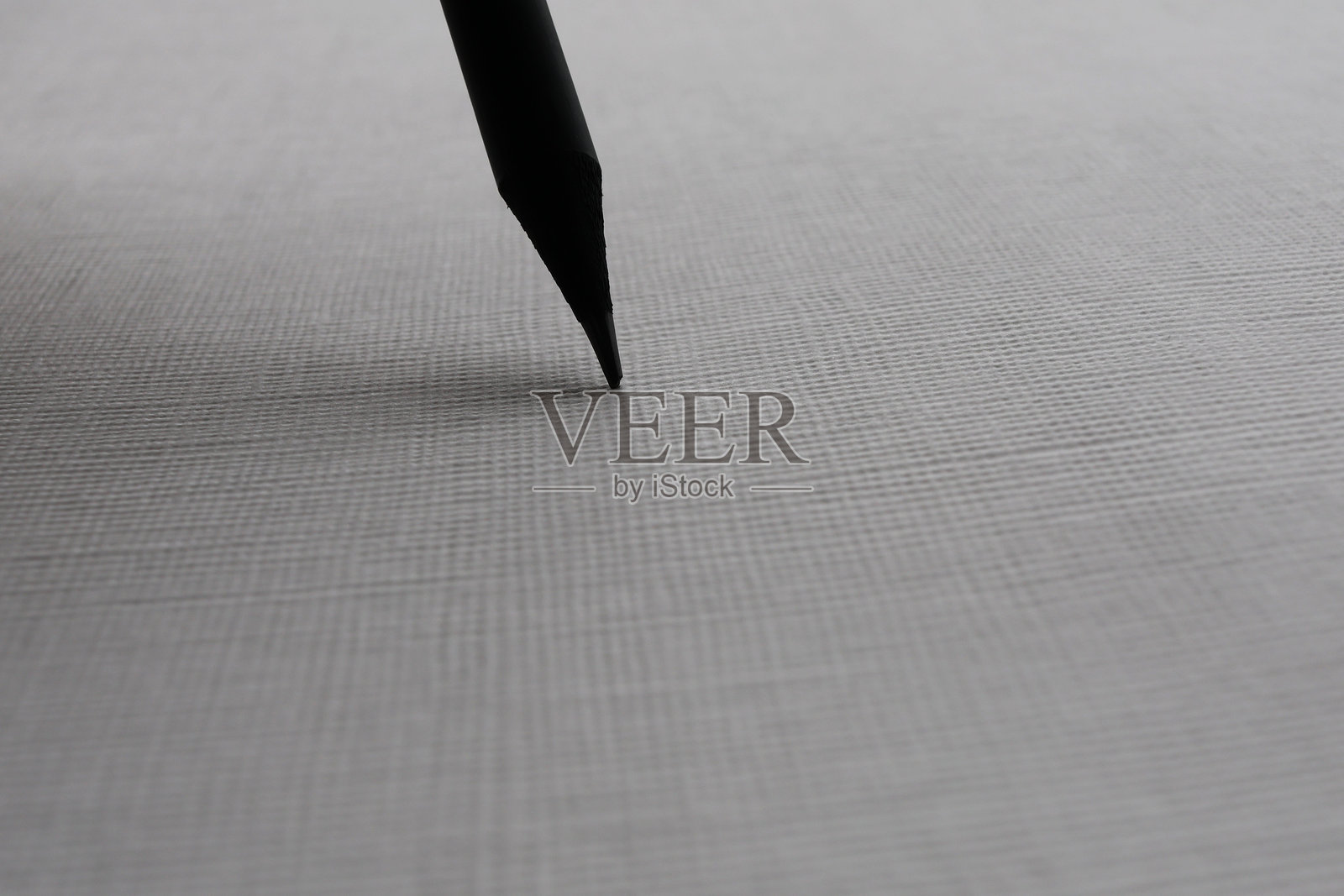 黑色铅笔在纸上的特写照片摄影图片