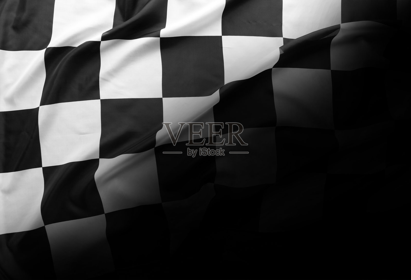 黑色背景上的方格旗照片摄影图片