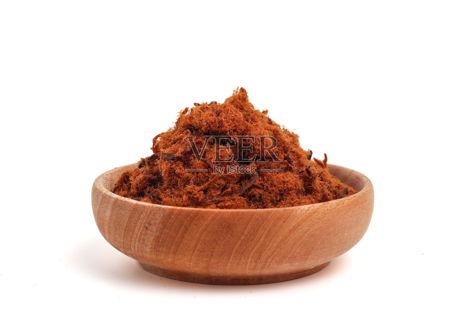 白色背景上的牛肉松。照片摄影图片