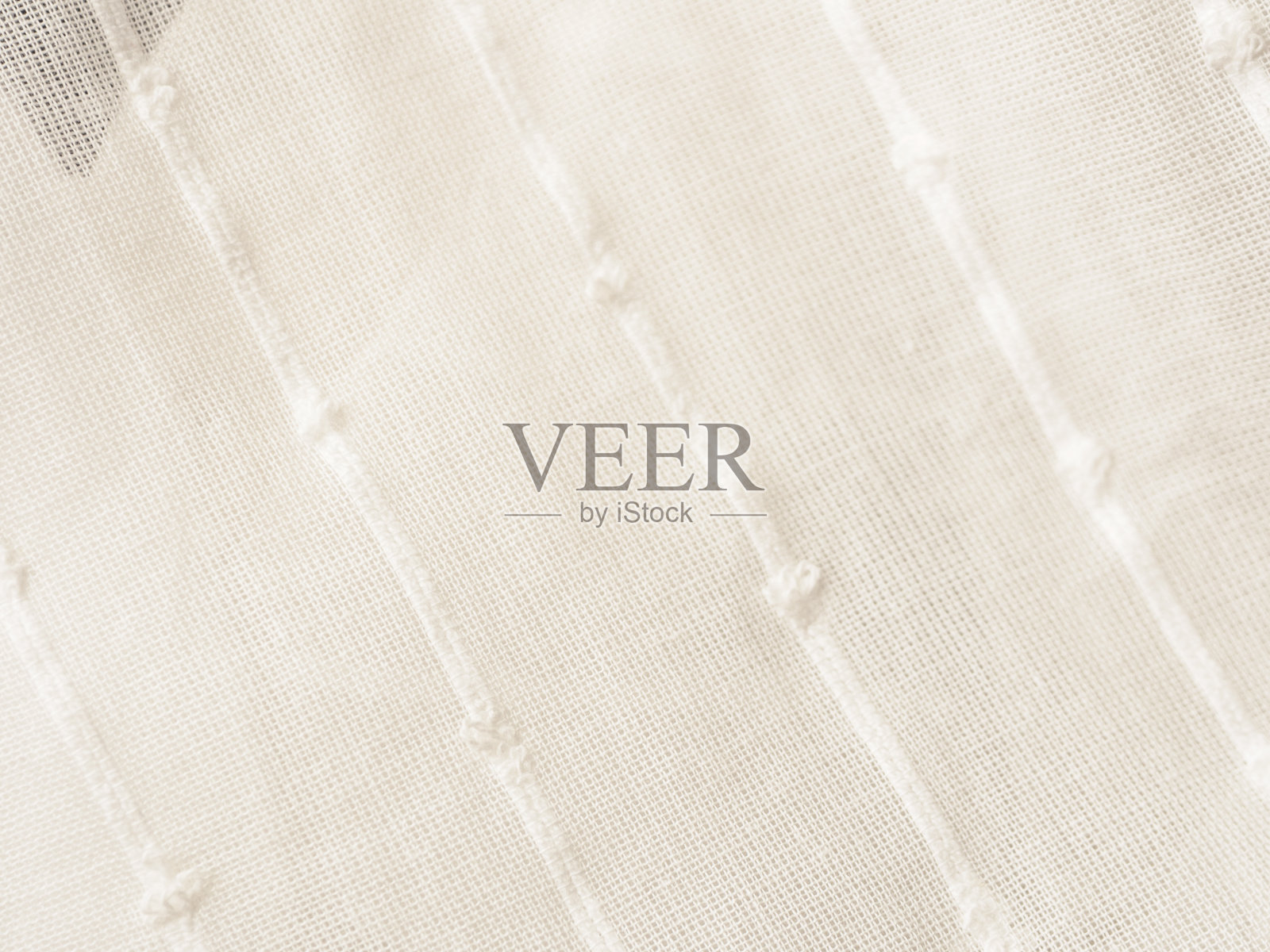 轻薄透明的面料特写，阳光透过，营造出轻盈和通透的感觉照片摄影图片