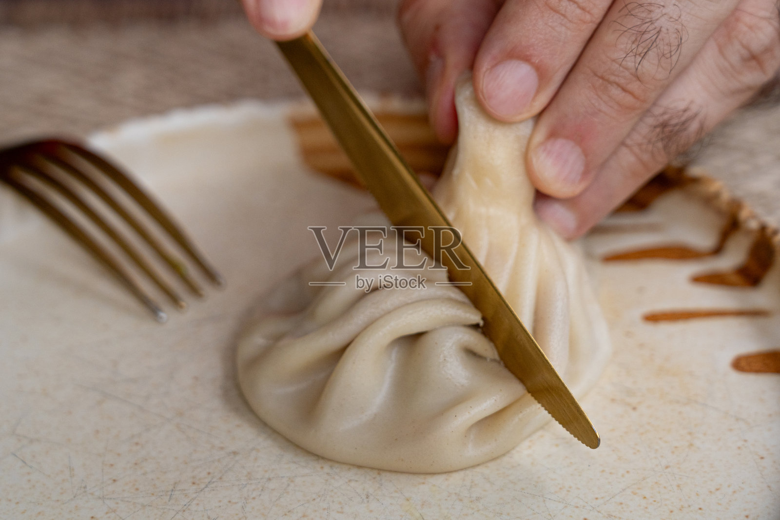 格鲁吉亚饺子，肉馅饺子，辛辣的饺子也称为点心、莫莫、饺子、曼蒂照片摄影图片