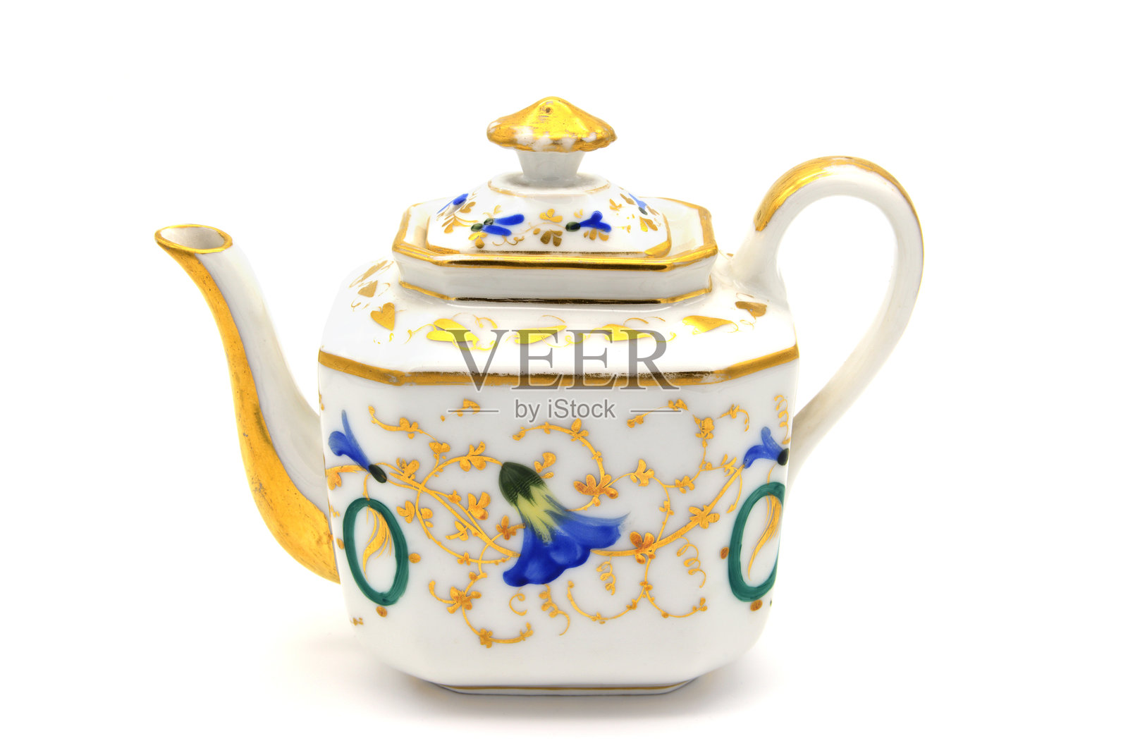 白色背景上的茶壶特写照片摄影图片