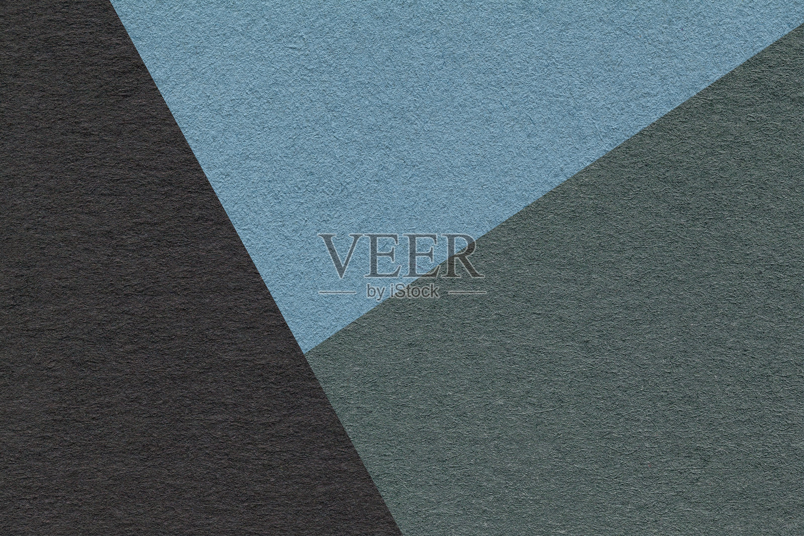 深绿色、黑色和蓝色阴影的手工纸背景纹理，特写。复古抽象纸板的结构。照片摄影图片