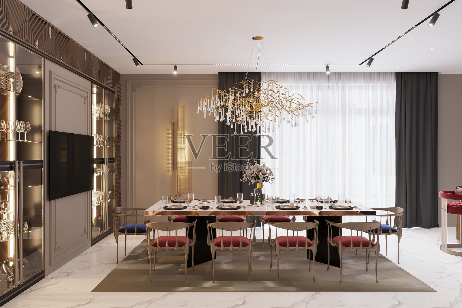 优雅现代的餐厅，配有奢华的吊灯和设计师家具照片摄影图片