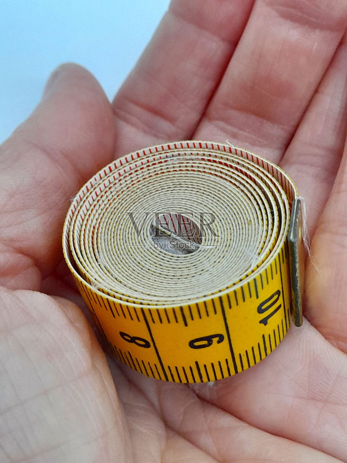 手持卷尺照片摄影图片