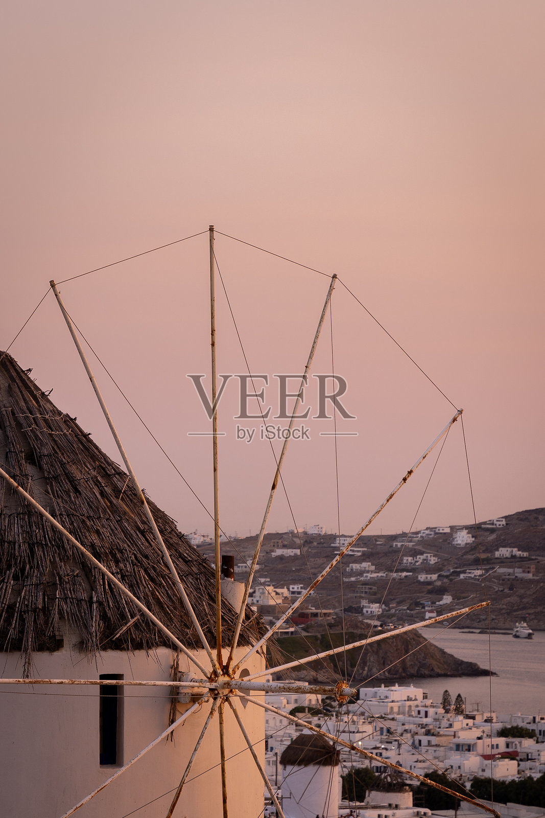 美丽的米科诺斯风车日落景观照片摄影图片