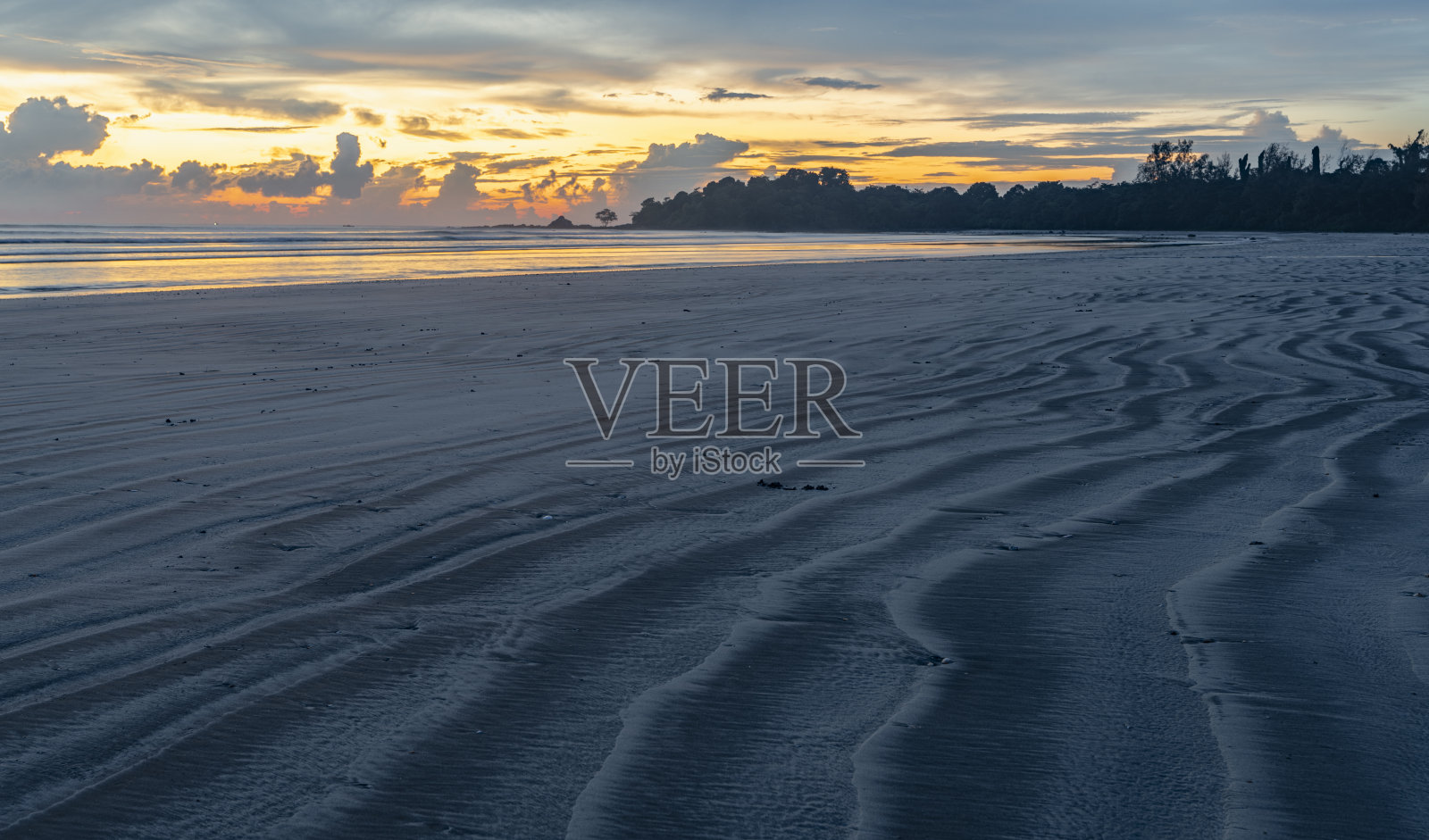 德沙鲁沙滩展示沙子上的图案照片摄影图片