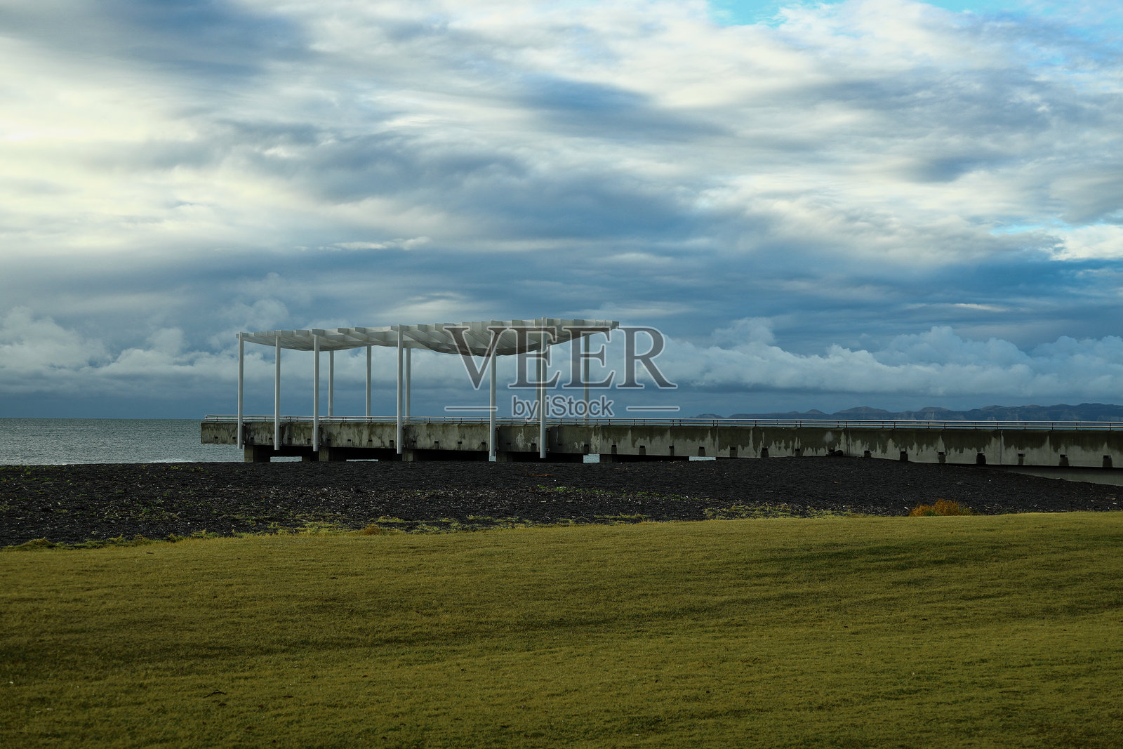 新西兰纳皮尔海滨海洋大道观景平台的日出照片摄影图片