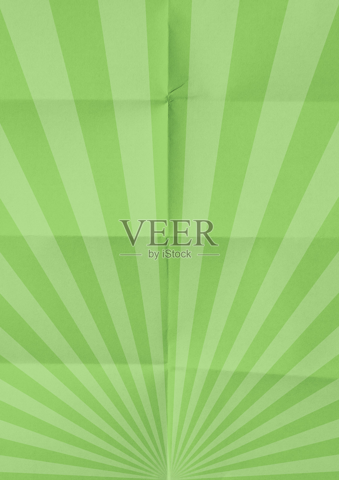 复古纸张背景，绿色阳光放射状图案纹理。照片摄影图片