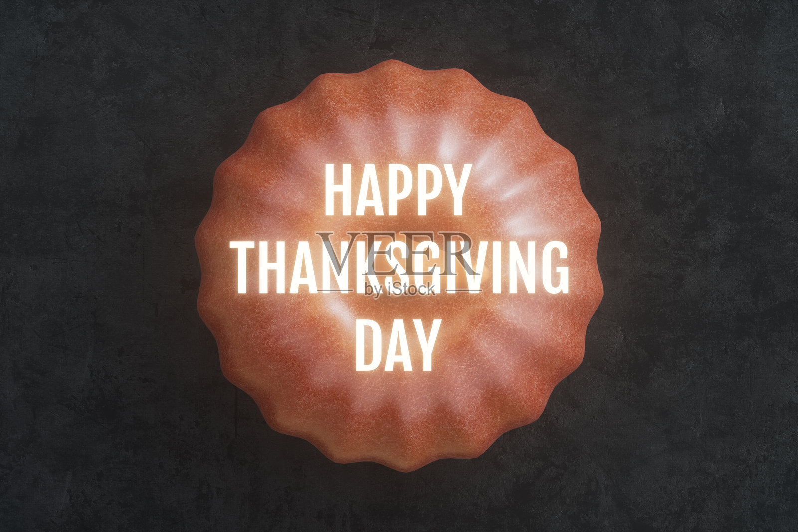 感恩节快乐的霓虹文字与黑色背景上的南瓜照片摄影图片