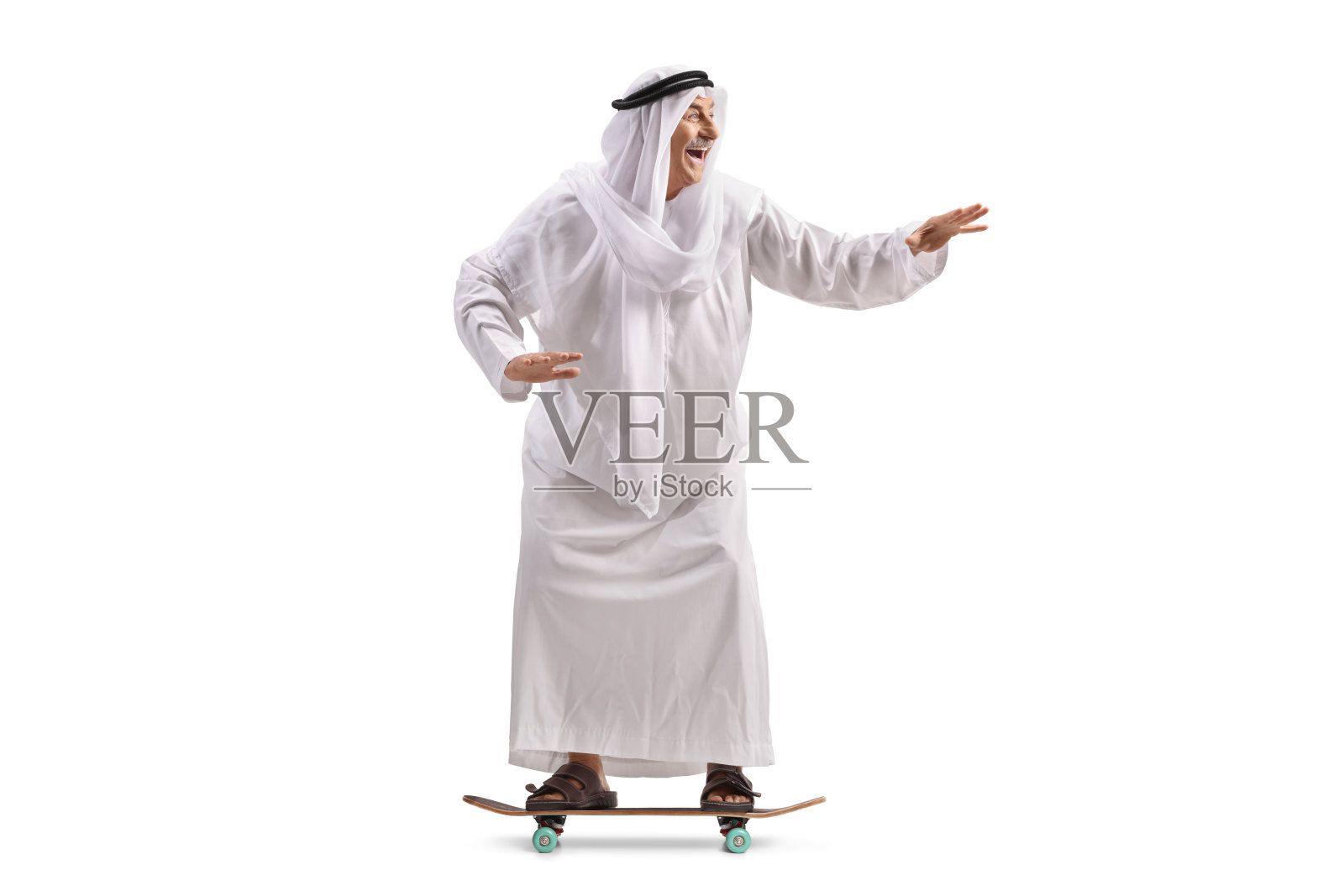 玩滑板的阿拉伯男子照片摄影图片