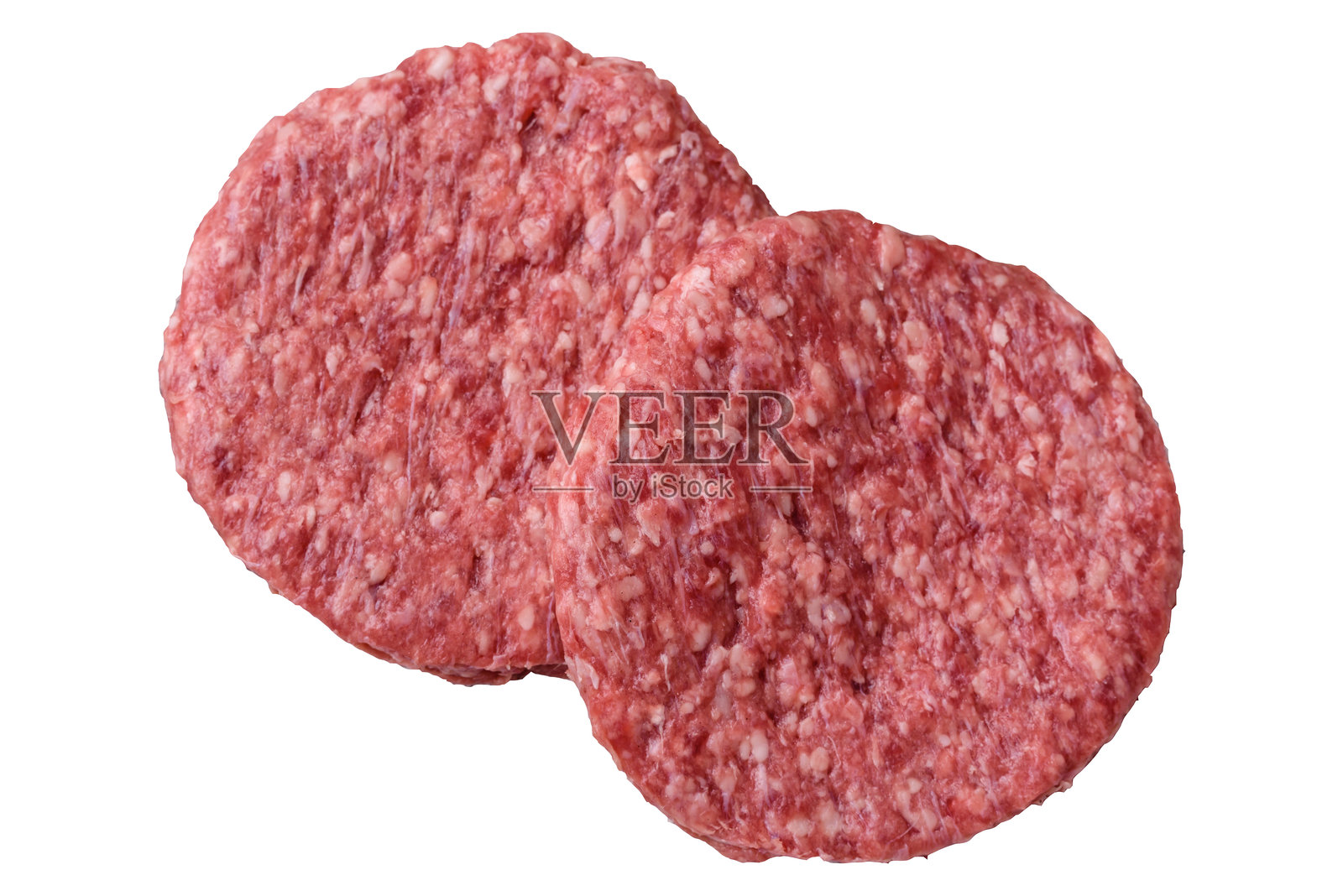 新鲜生牛肉汉堡饼，加入盐和香料照片摄影图片