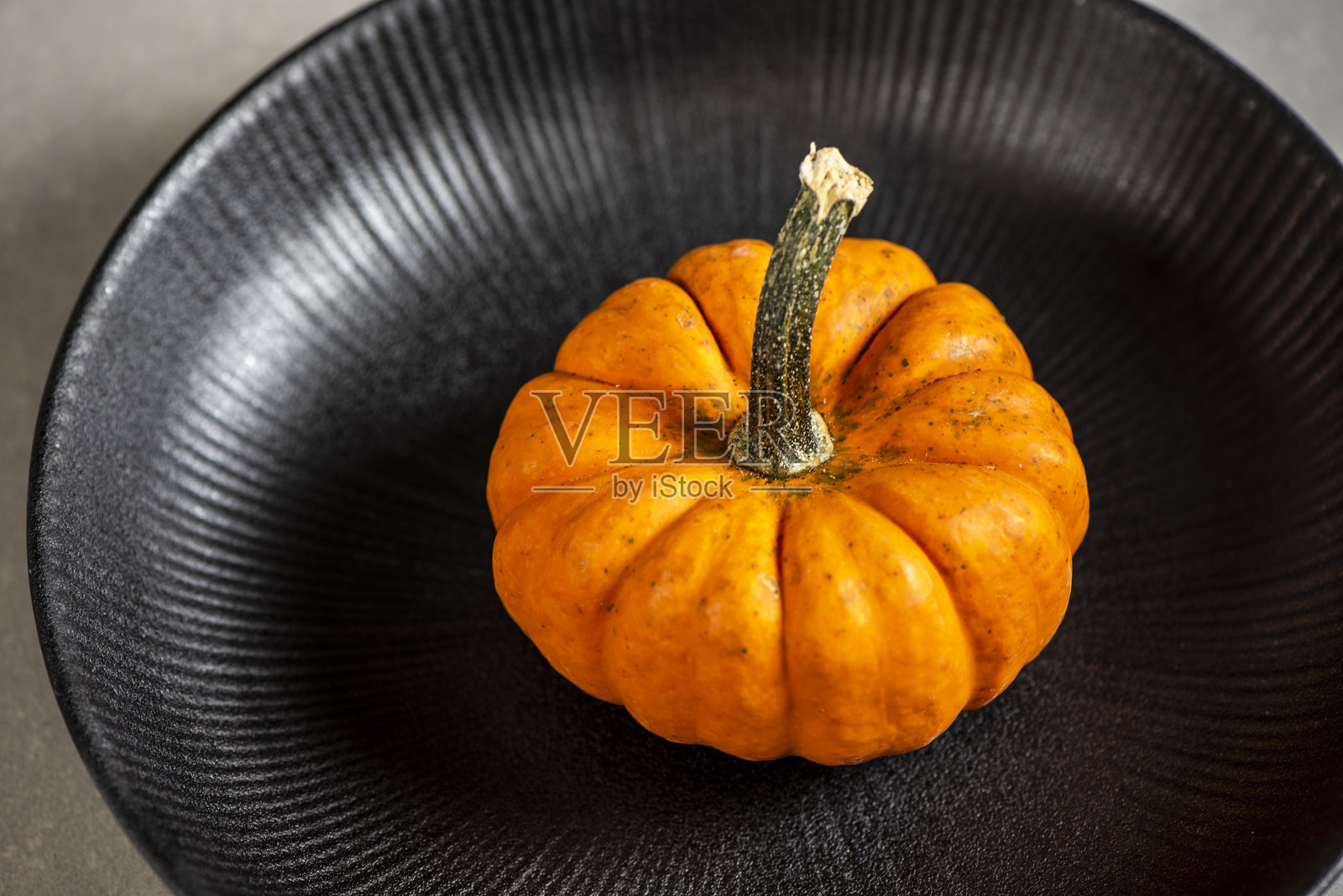 盘子上的南瓜照片摄影图片