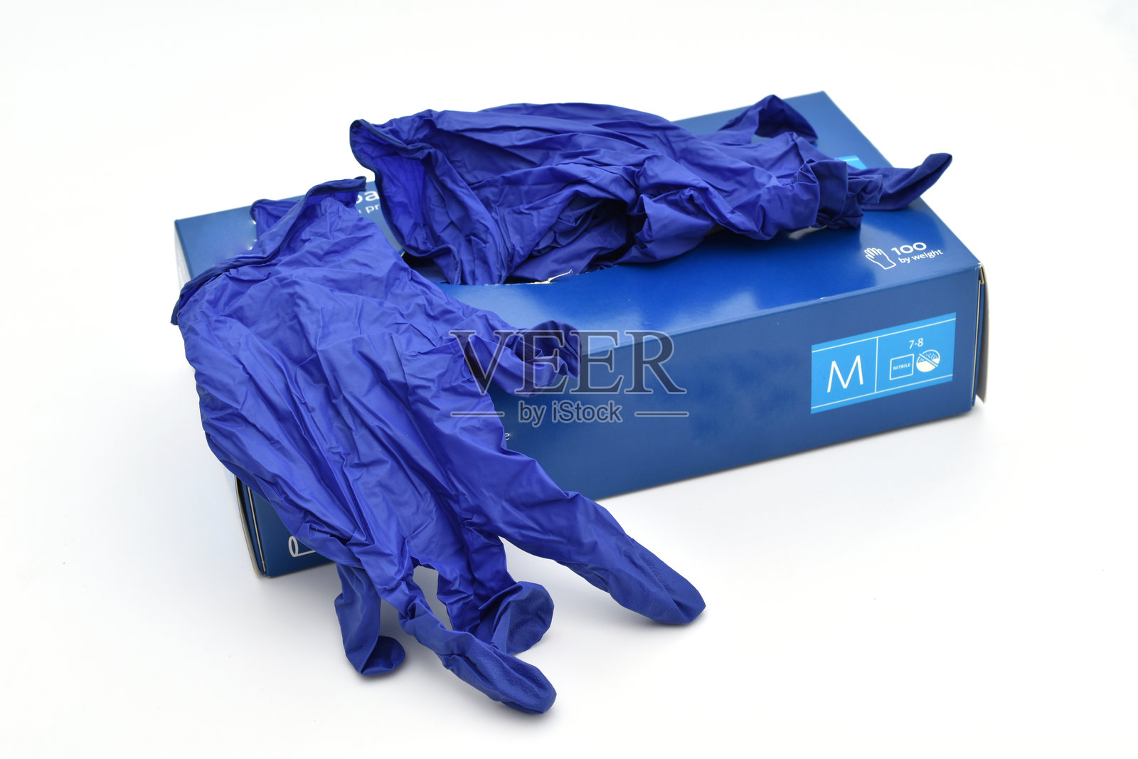 一盒工作用橡胶手套。照片摄影图片