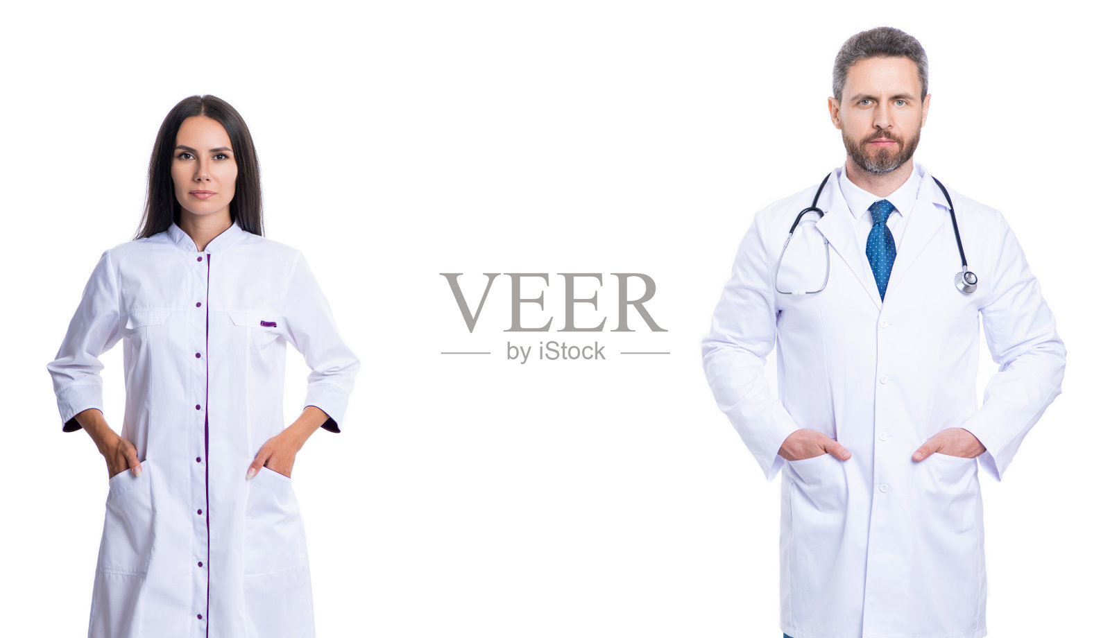 医疗团队。医院中的医疗和保健工作者，背景为白色。两位医生代表医疗服务。健康保险。医疗与保健。留白空间。照片摄影图片