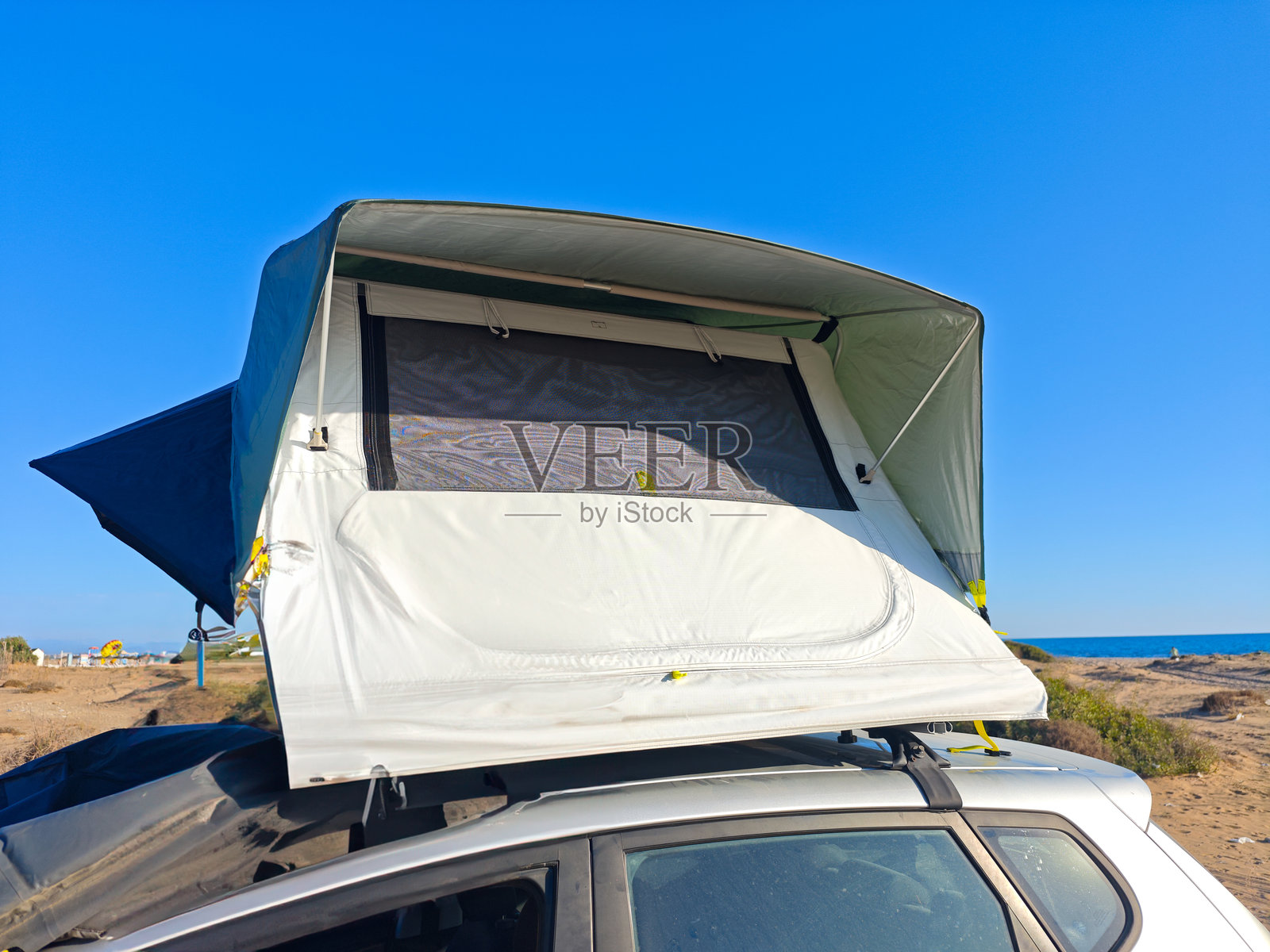 海滩上的汽车帐篷照片摄影图片